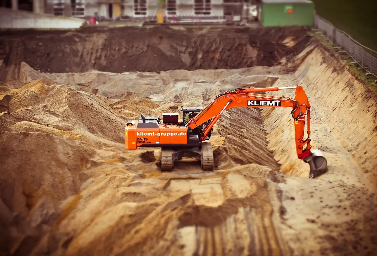 Site analysis of a construction site, showcasing topography, building footprints, and surrounding infrastructure.