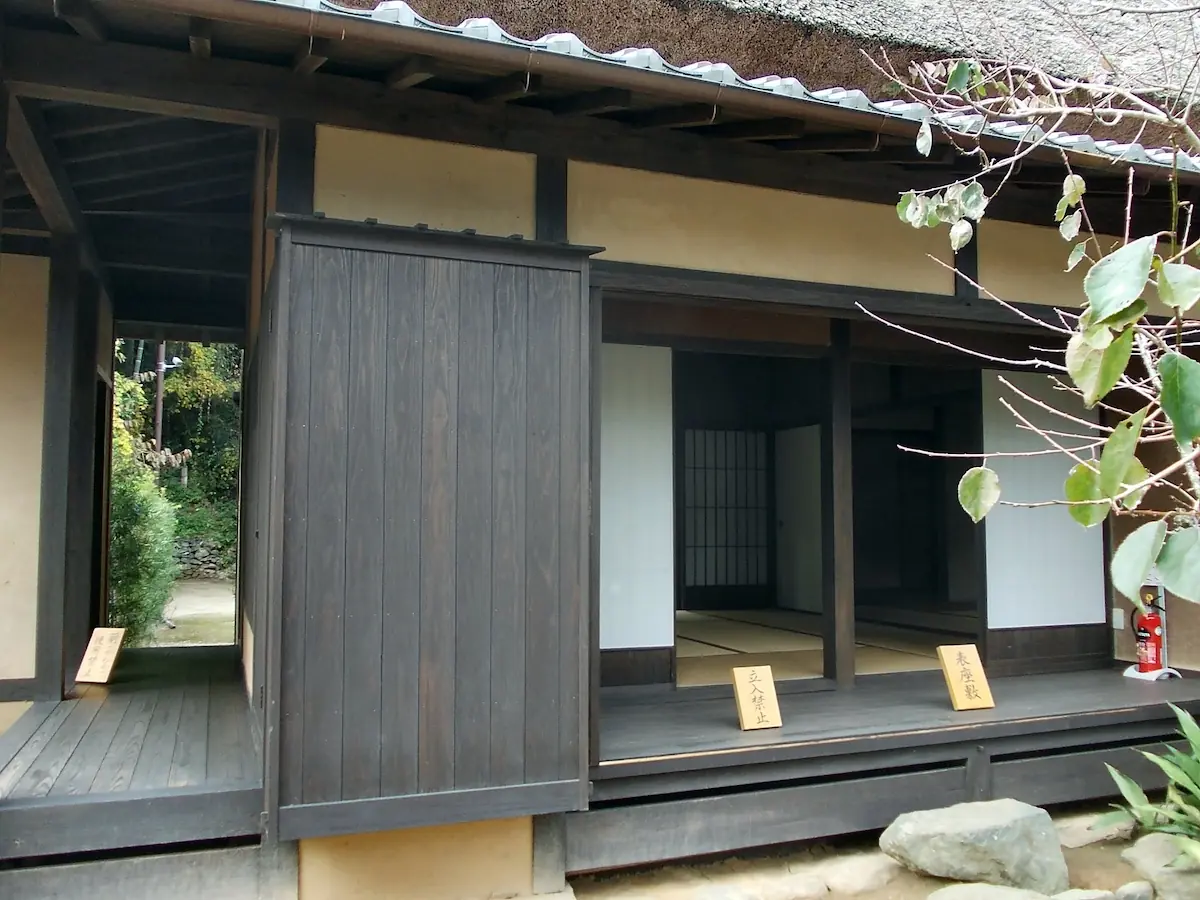 Japanese houses connected by an engawa, a traditional wooden veranda running between buildings.
