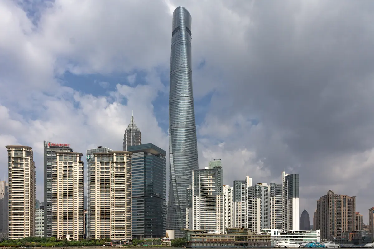Shanghai Tower in Shanghai, showcasing its unique spiraling design and towering height against the city skyline.