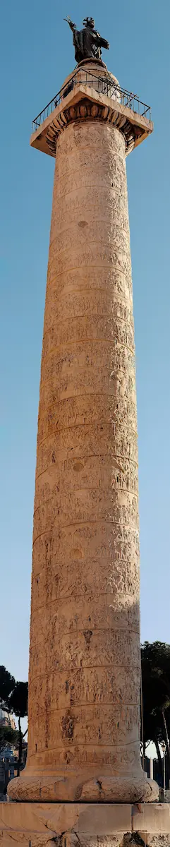 Trajan's Column viewed from the north with carved relief bands wrapping around the marble shaft.