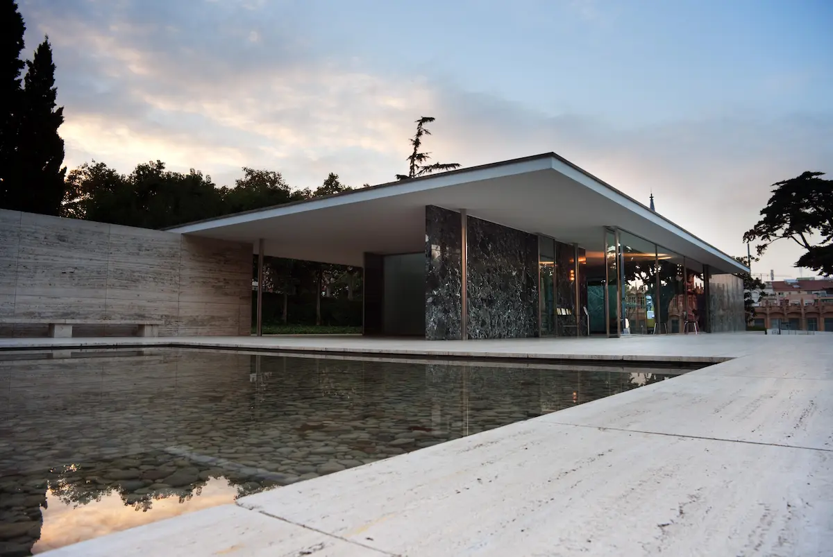 minimalist exterior of the Barcelona Pavilion by Mies van der Rohe, showcasing simplicity and expert design