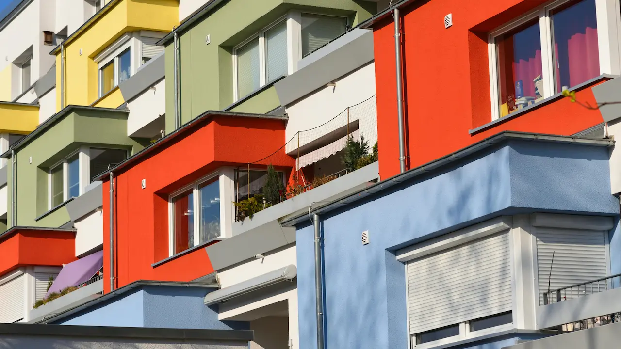 colorful facade of an apartment building in Hannover, Germany, featuring a unique and vibrant design concept
