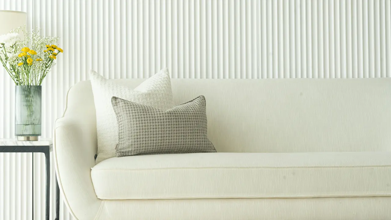 pillows on a white sofa in an elegant minimalist modern design in Dubai