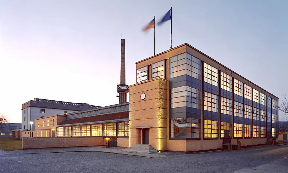 The Fagus Factory in Germany, an iconic example of industrial design, featuring clean lines, large windows, and functional yet elegant architecture.