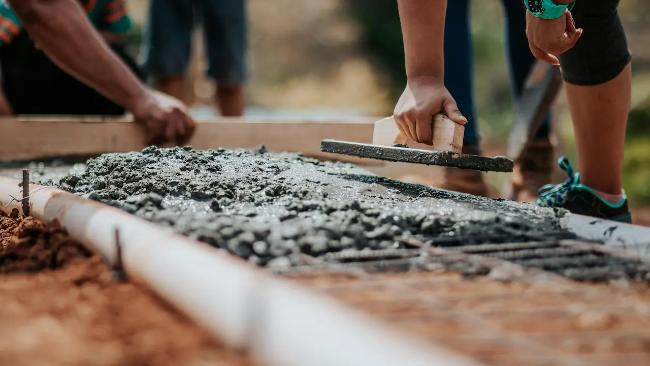 A foundation repair crew working on a large-scale foundation project.