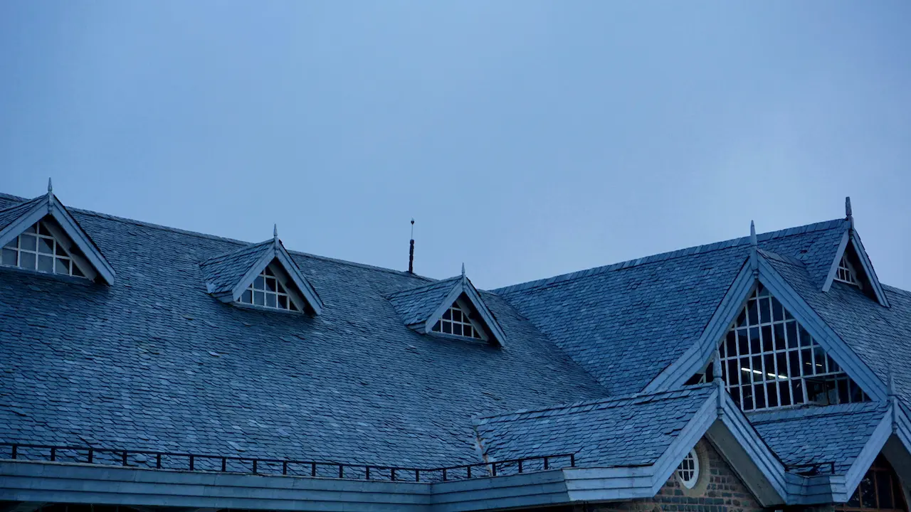 gable roof with two sloping sides meeting at a central ridge