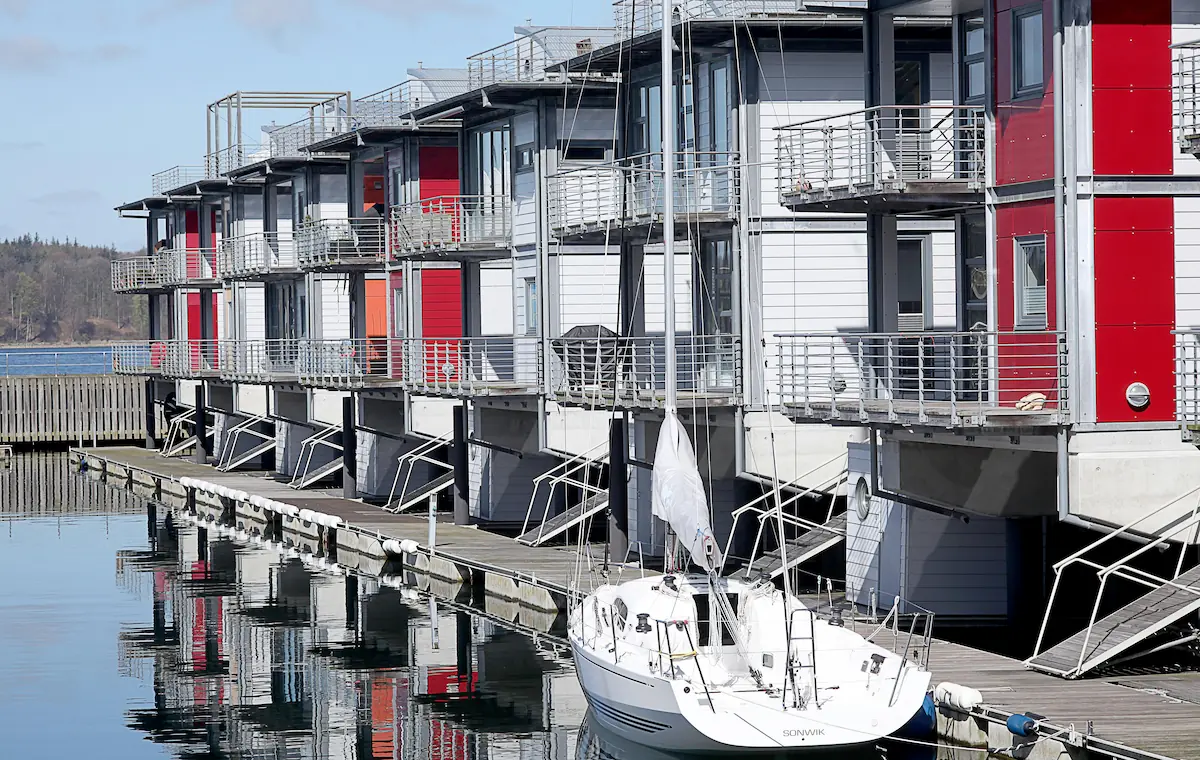 Modern houses raised on pillars.