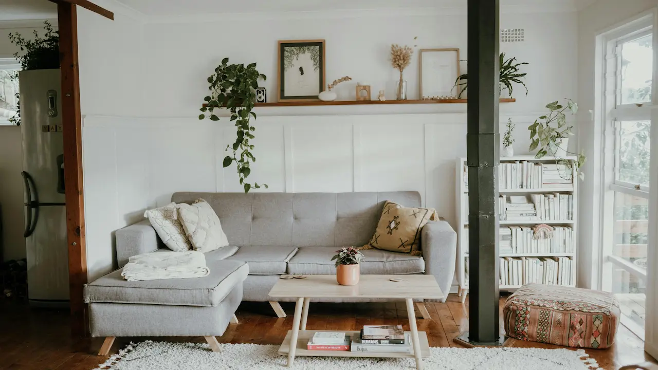Industrial Scandinavian living room with minimalist design and natural elements.