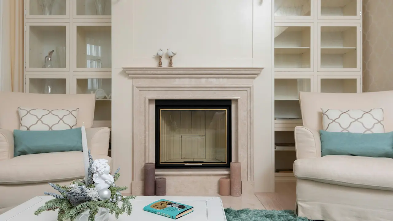 Living room with armchairs placed near a table, creating a cozy and inviting atmosphere.