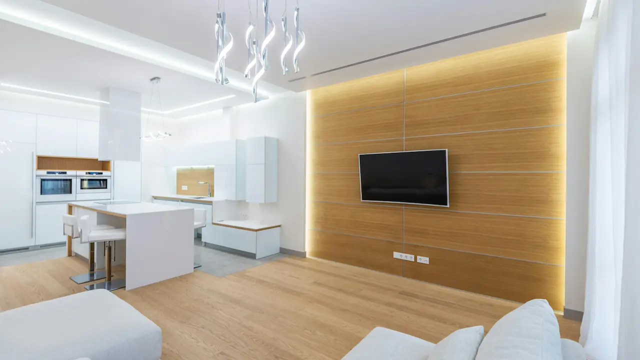 Luxury kitchen and living room featuring low-density fiberboard tiles and wall panels.