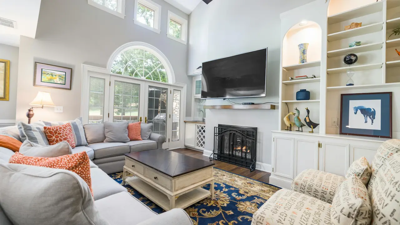 Modern cozy living room with comfortable seating and stylish decor.