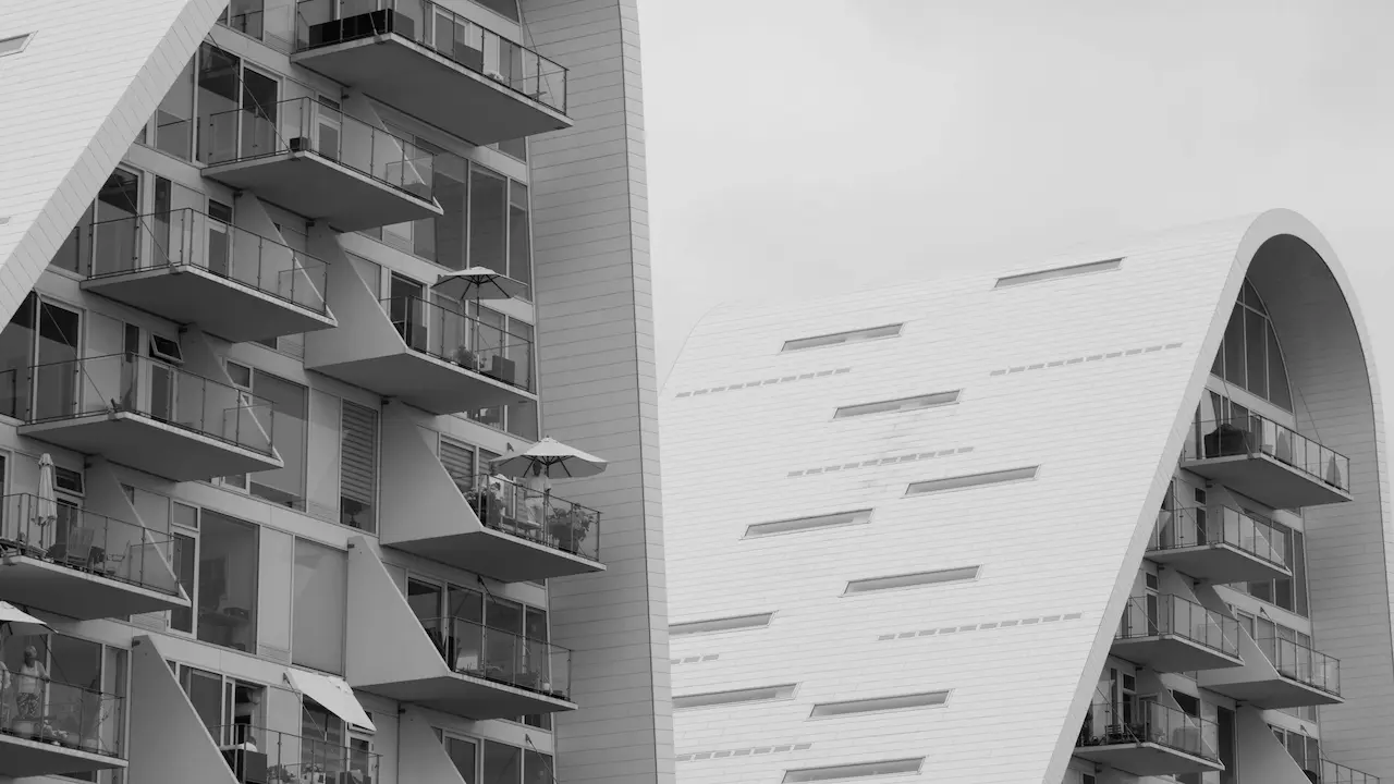 wavy building design optimizing solar energy harvesting and natural light