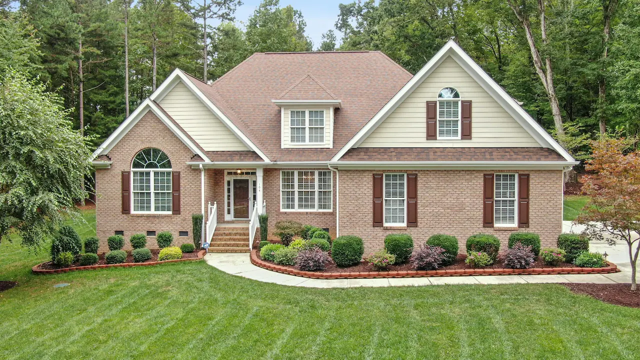 open gable roof line on a brick house in Timberlake, NC, United States