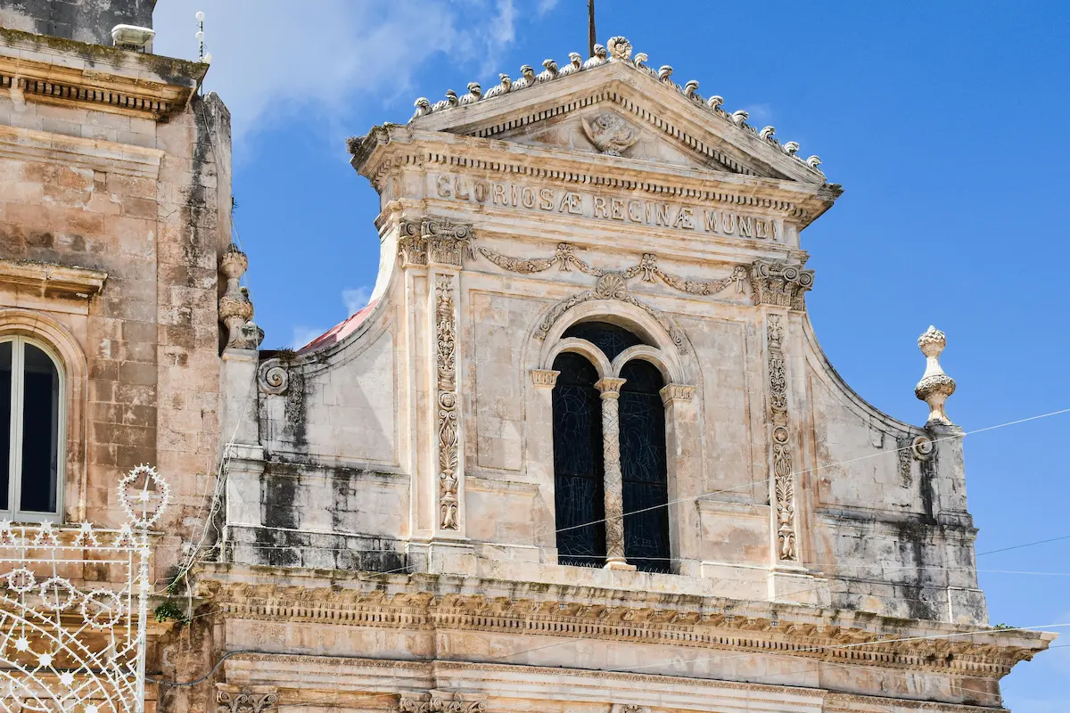 Intricate Baroque architecture in Apulia, Italy showcases detailed facades and sculptures.