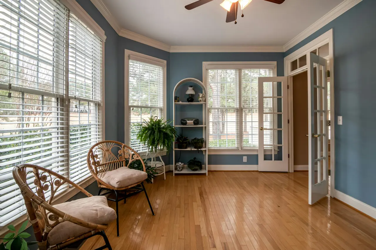 French doors leading out to a covered patio, creating a seamless indoor-outdoor flow