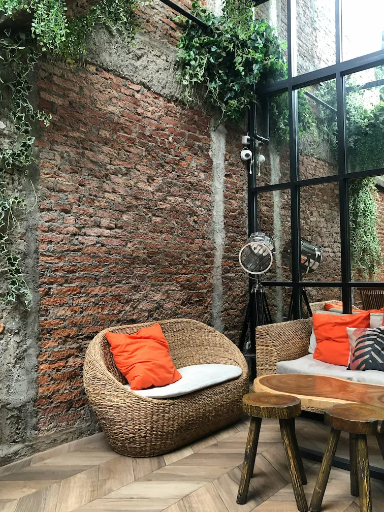 Rustic modern terrace with furniture in Penjaringan, Jakarta, Indonesia.