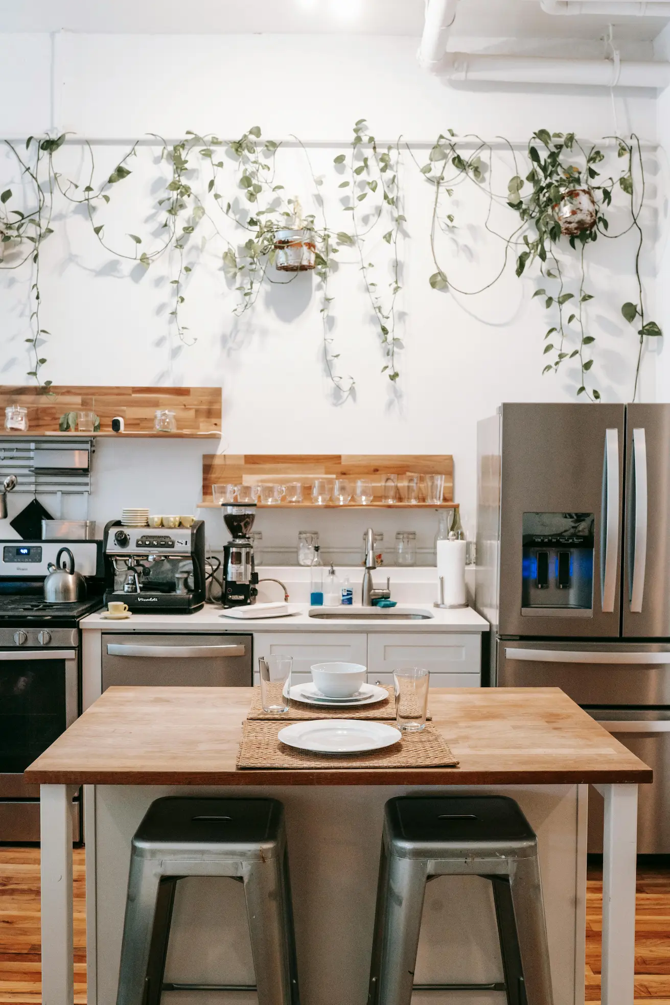 kitchen and dining area in Scandinavian style with cozy decor in a modern apartment
