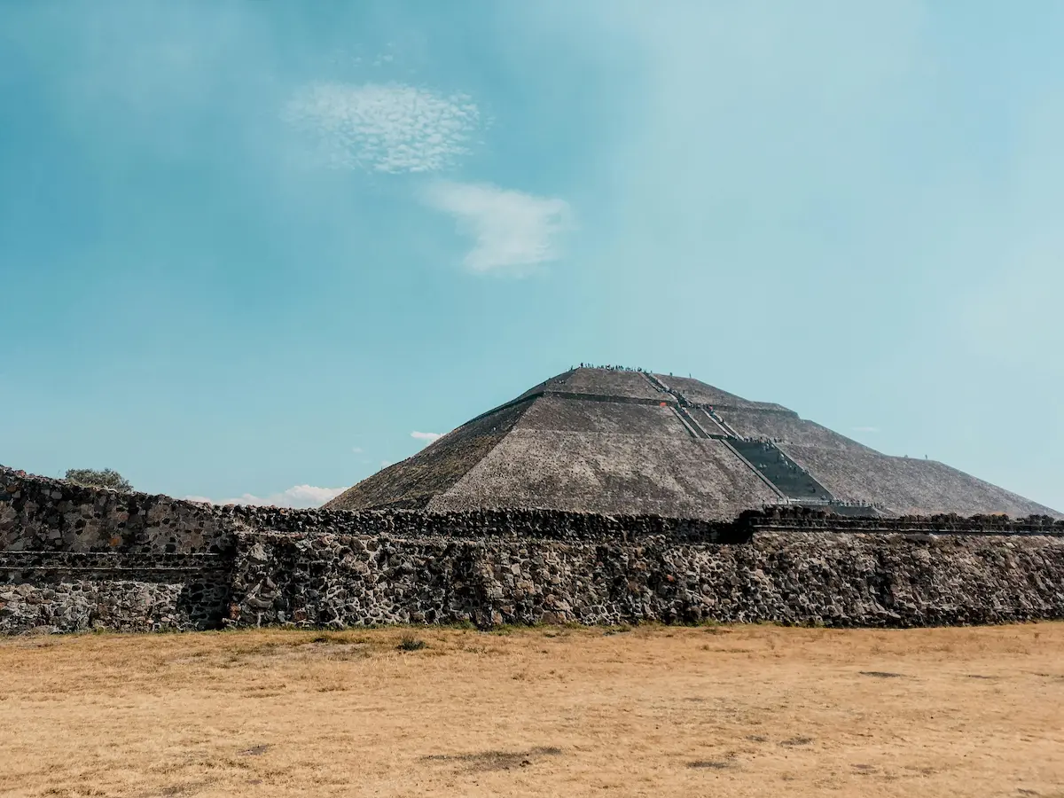 The ancient architecture of Teotihuacan, featuring monumental pyramids and complex urban design.