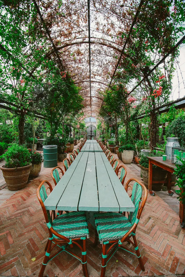 conservatory with garden and large dining table