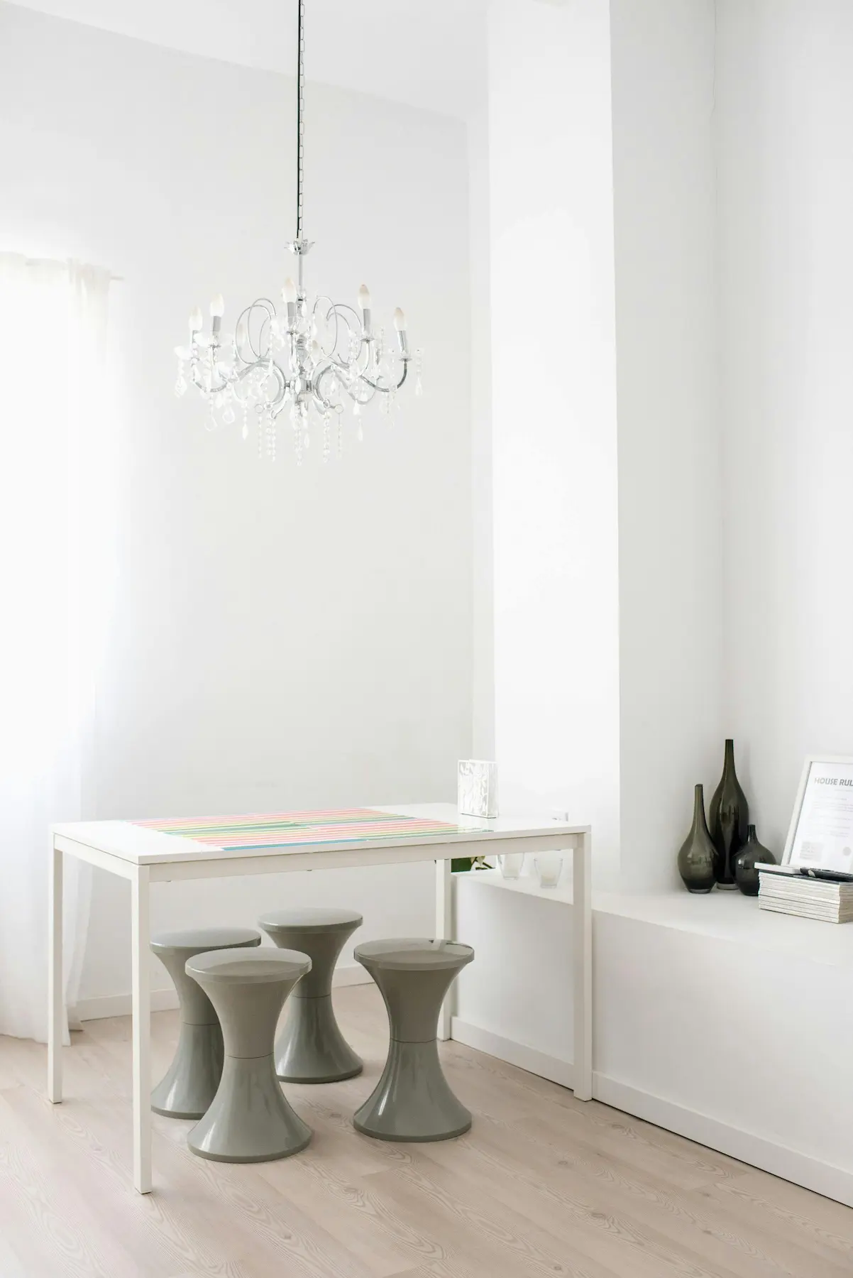 Interior of a stylish small modern room with minimal design, sleek furniture, and a well-balanced color scheme.