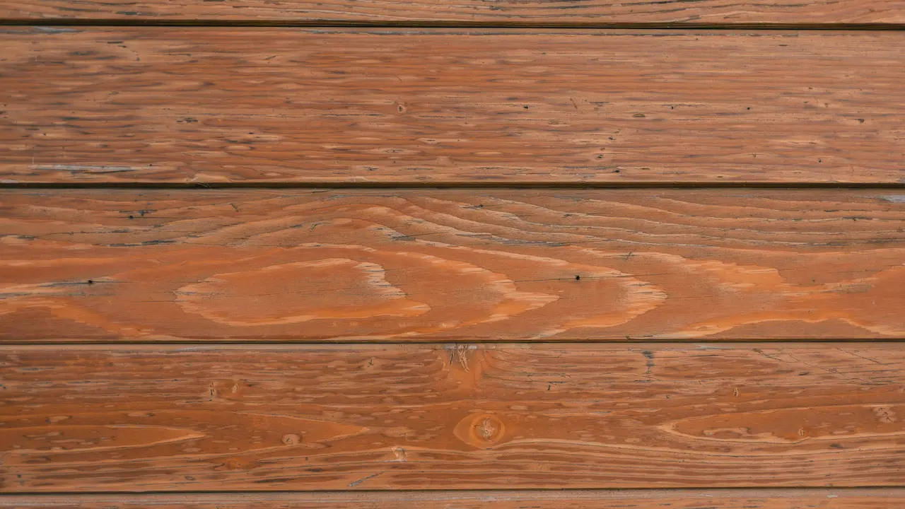 Oak panels with detailed grain patterns showcase classic craftsmanship in traditional wood architecture.