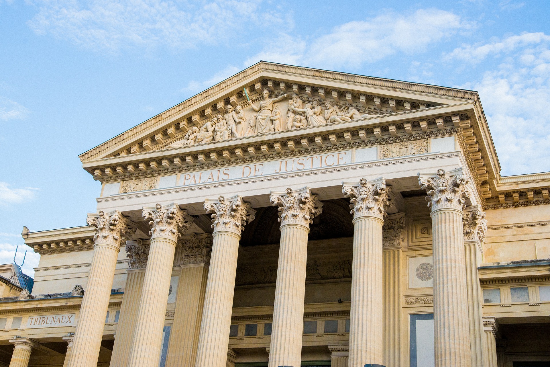 The Palace of Justice in Nîmes, a historic courthouse with classical architecture.