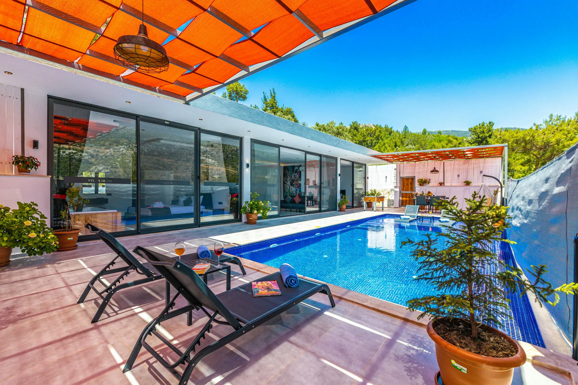 A luxury villa with a custom design in Kas, Turkey, featuring neon lighting and modern architecture.