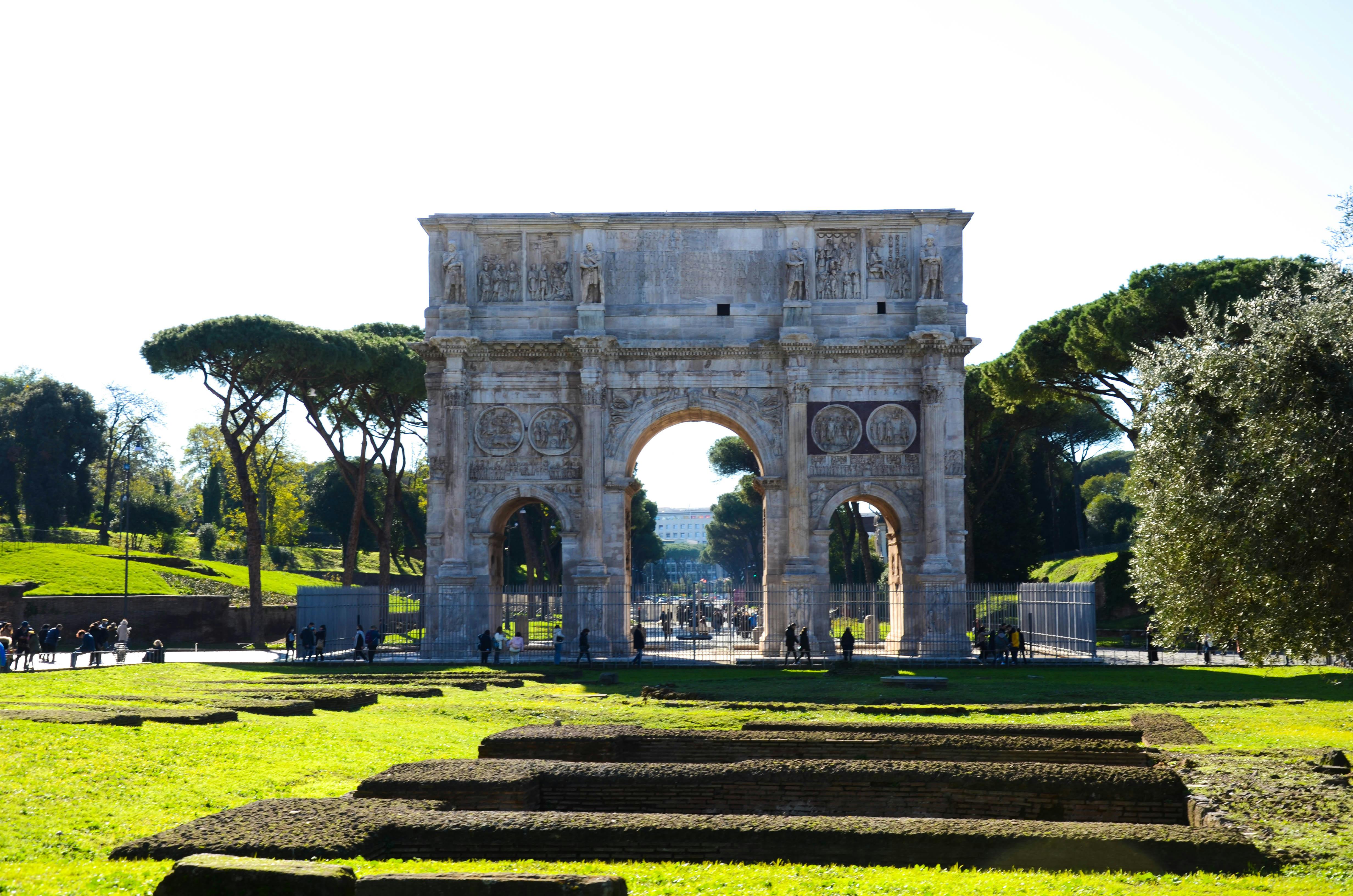 Triumphal Arch of Constantine in Rome with intricate reliefs and historic significance.