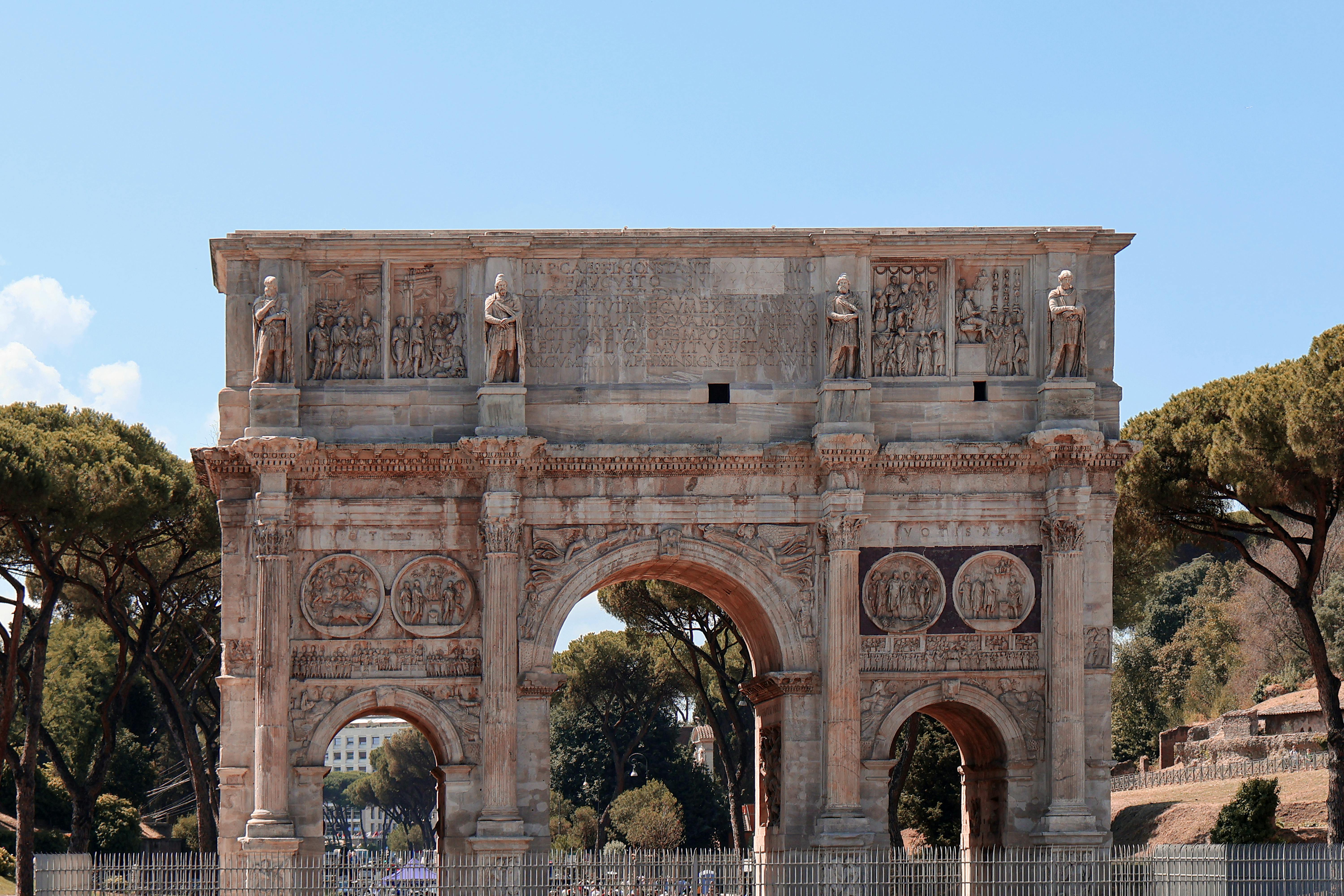 Arch of Constantine in Rome with detailed carvings and historic structure.