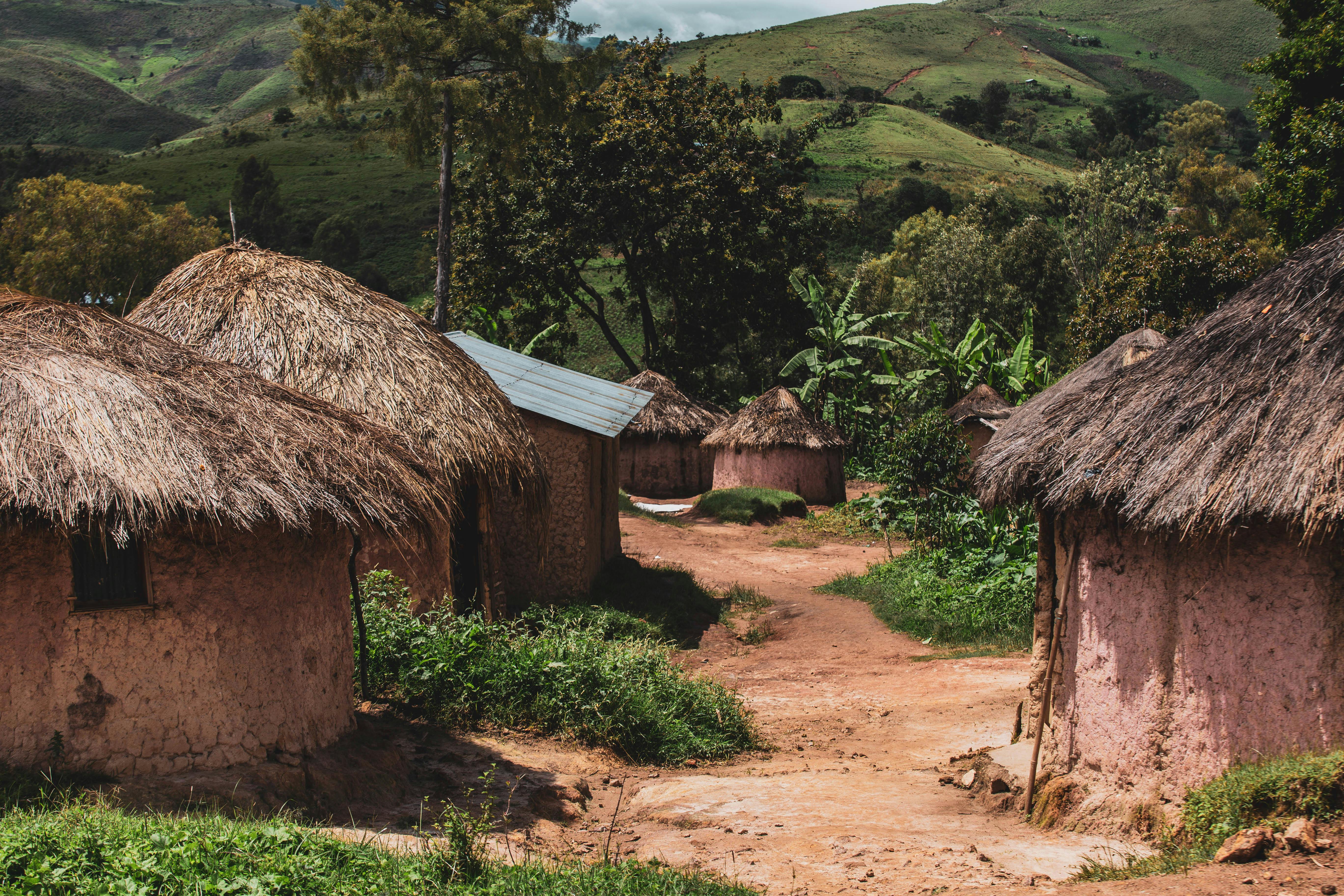 Authentic rural cottages in a village, featuring mud and bamboo huts with traditional design.