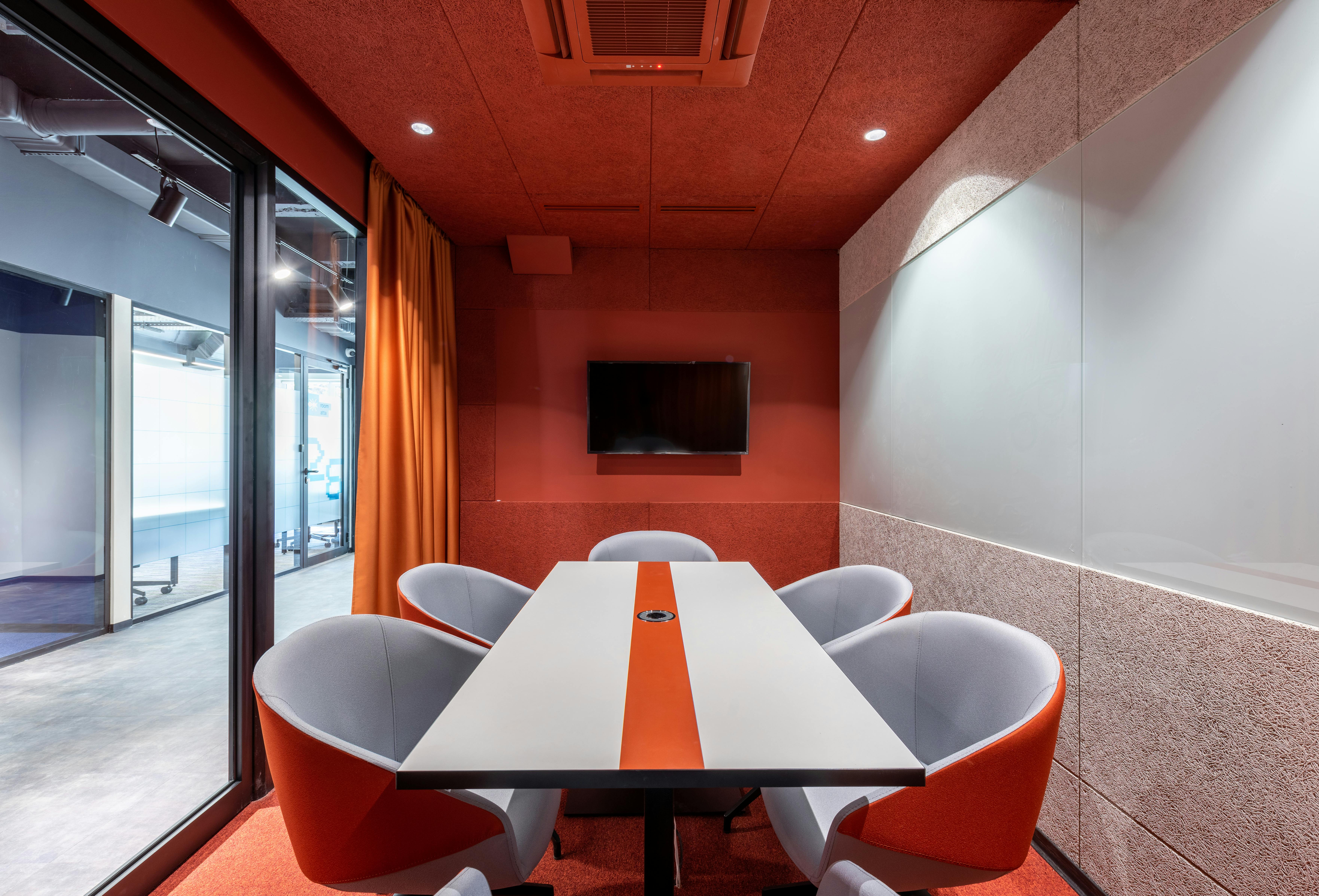 Bright red meeting room design.