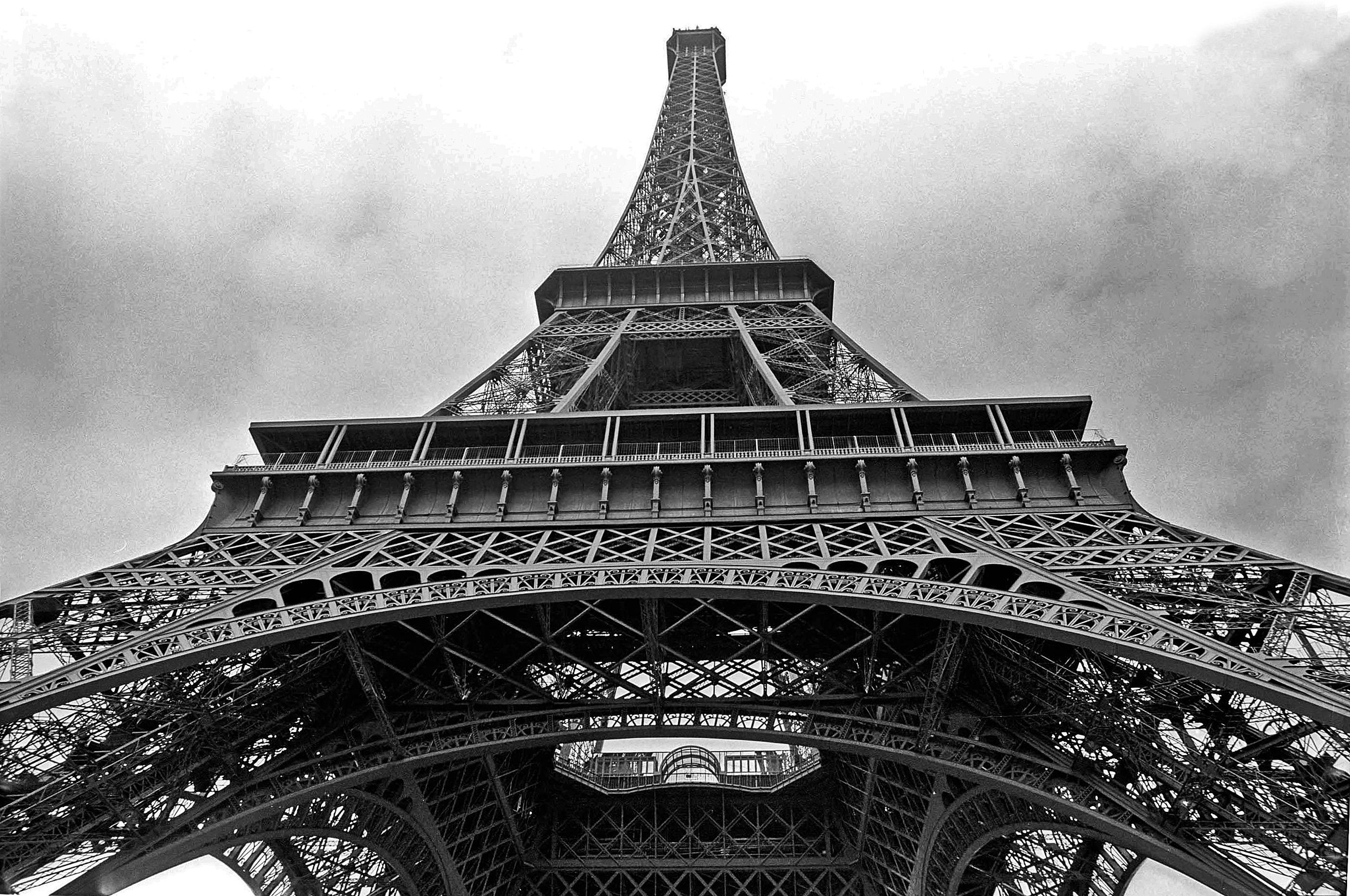 Eiffel Tower representing Industrial Age architecture with exposed iron structure and innovative engineering.
