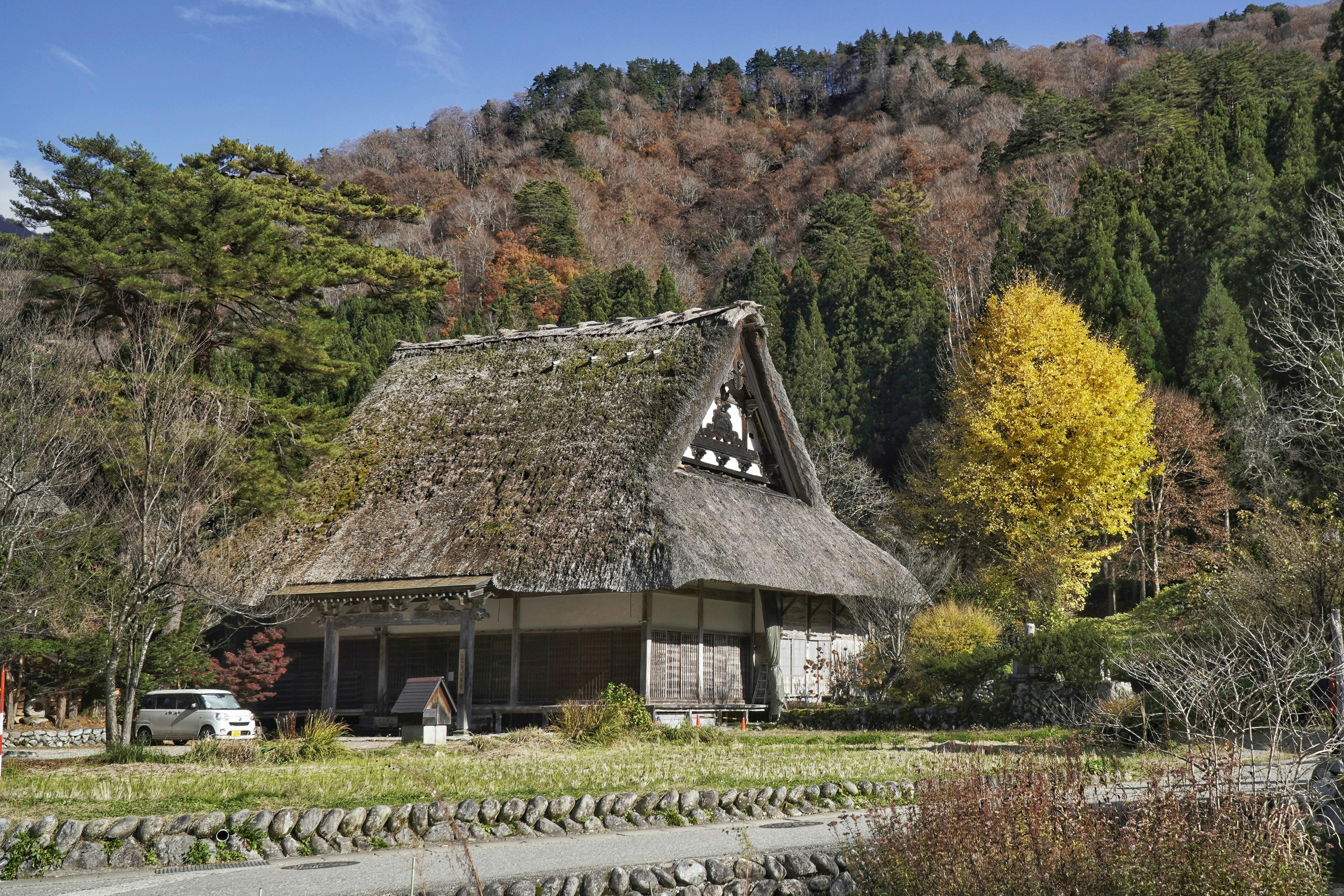 Steep-roofed Gassho-style house in Shirakawa, designed for harsh weather.