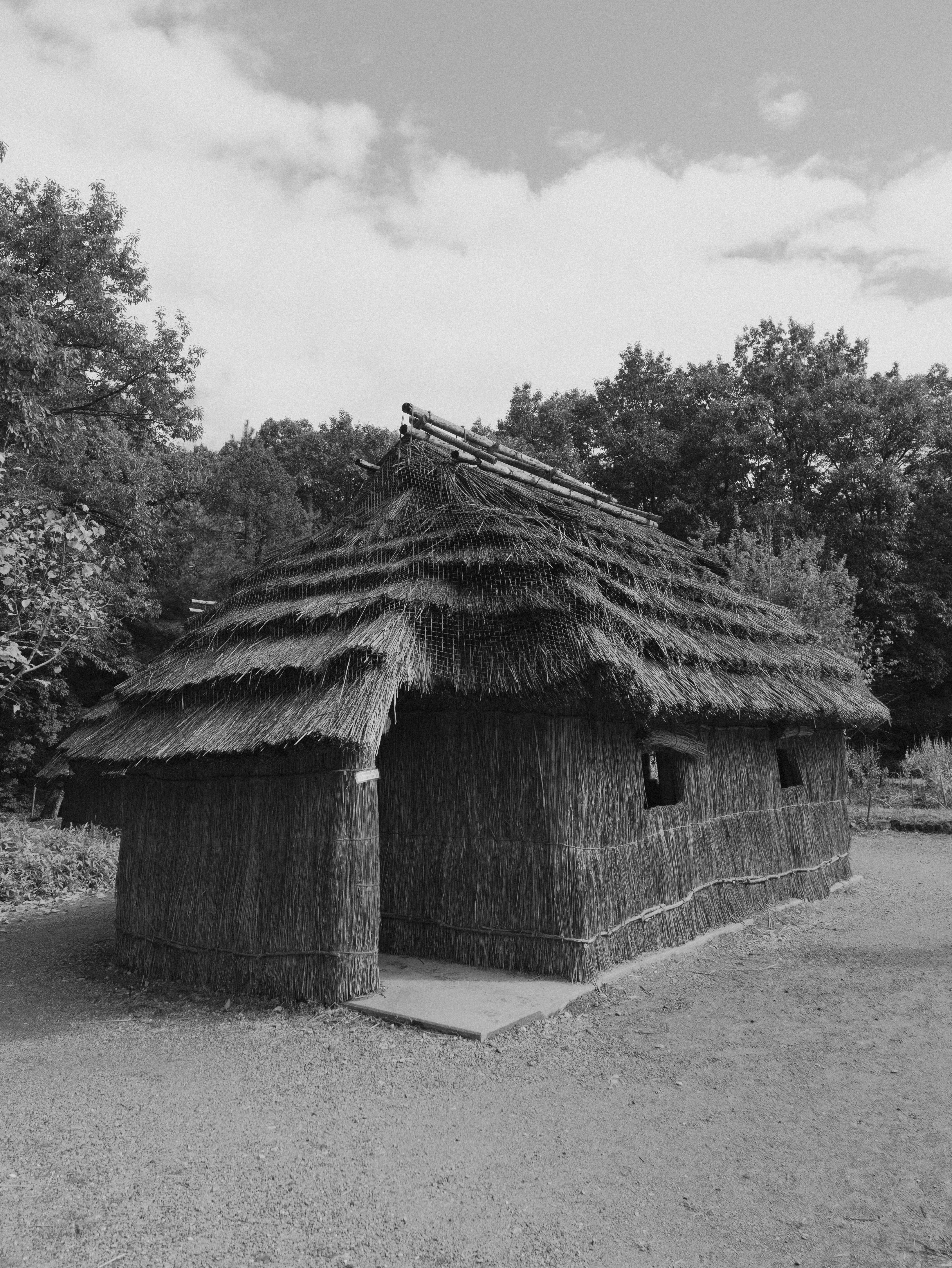 Black and white image of a traditional early-style Japanese house in Inuyama, Aichi, Japan.