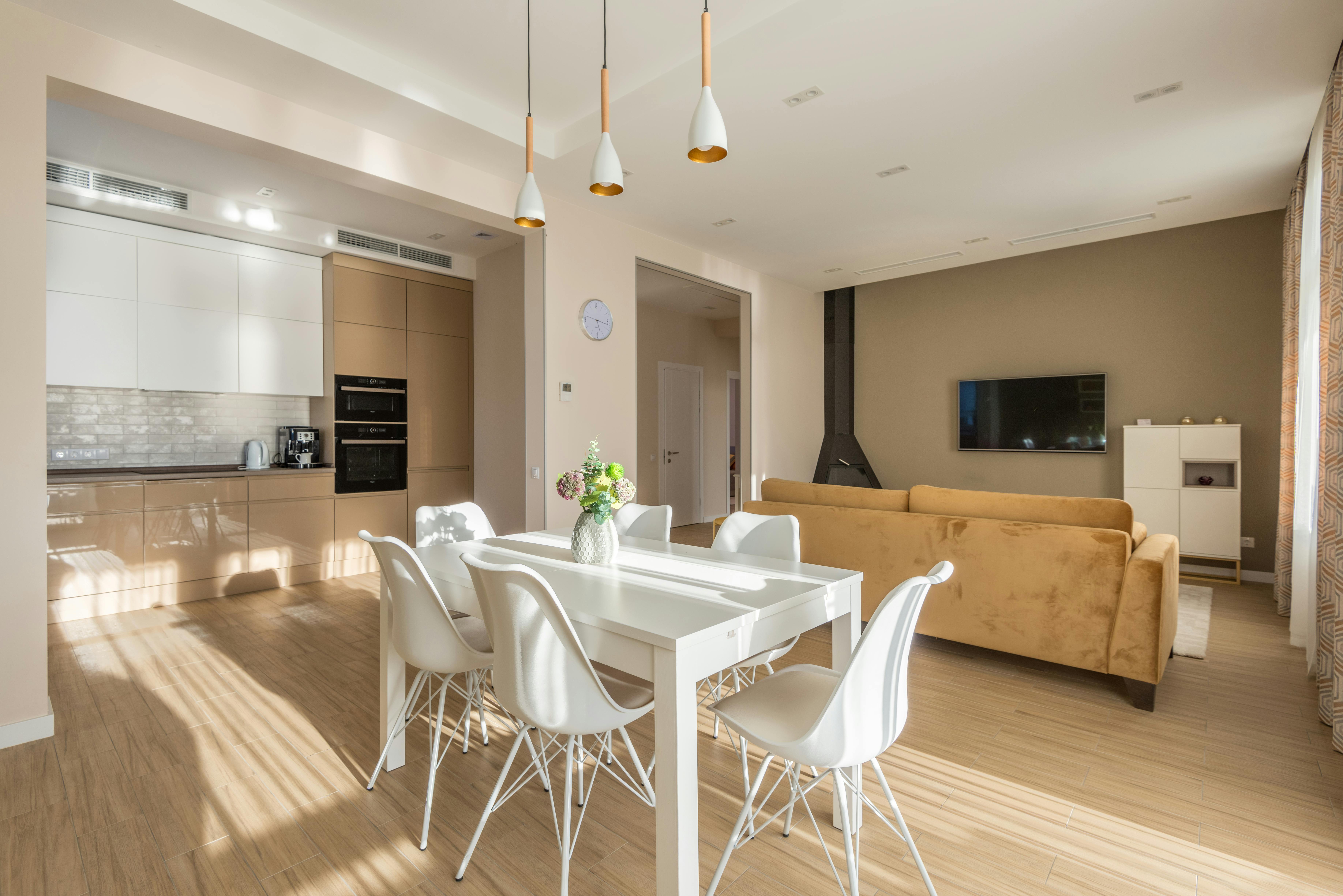 Modern interior with light wood floors and neutral-toned wall color creating a warm, balanced space.