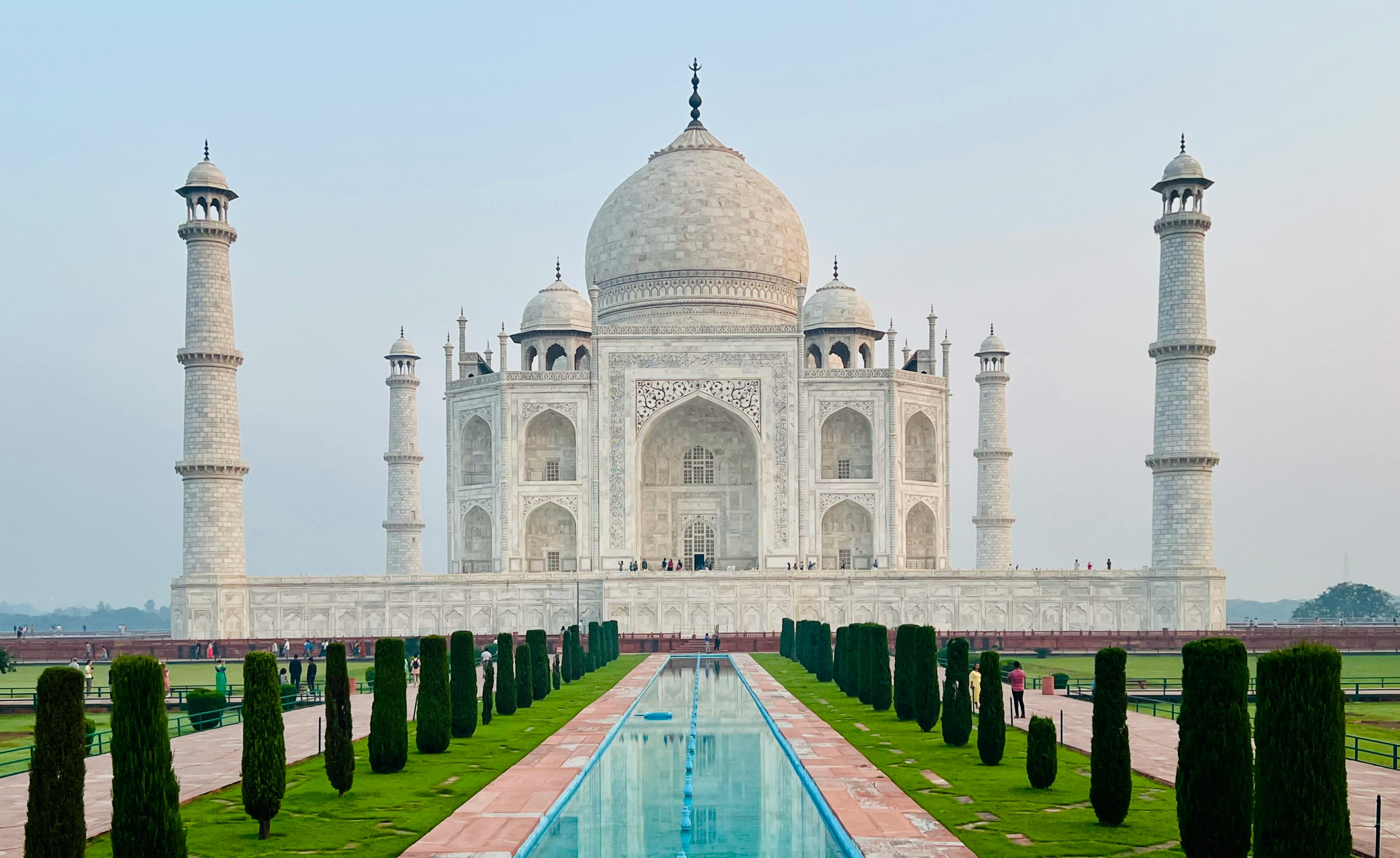 Facade of the Taj Mahal showcasing Mughal architectural style