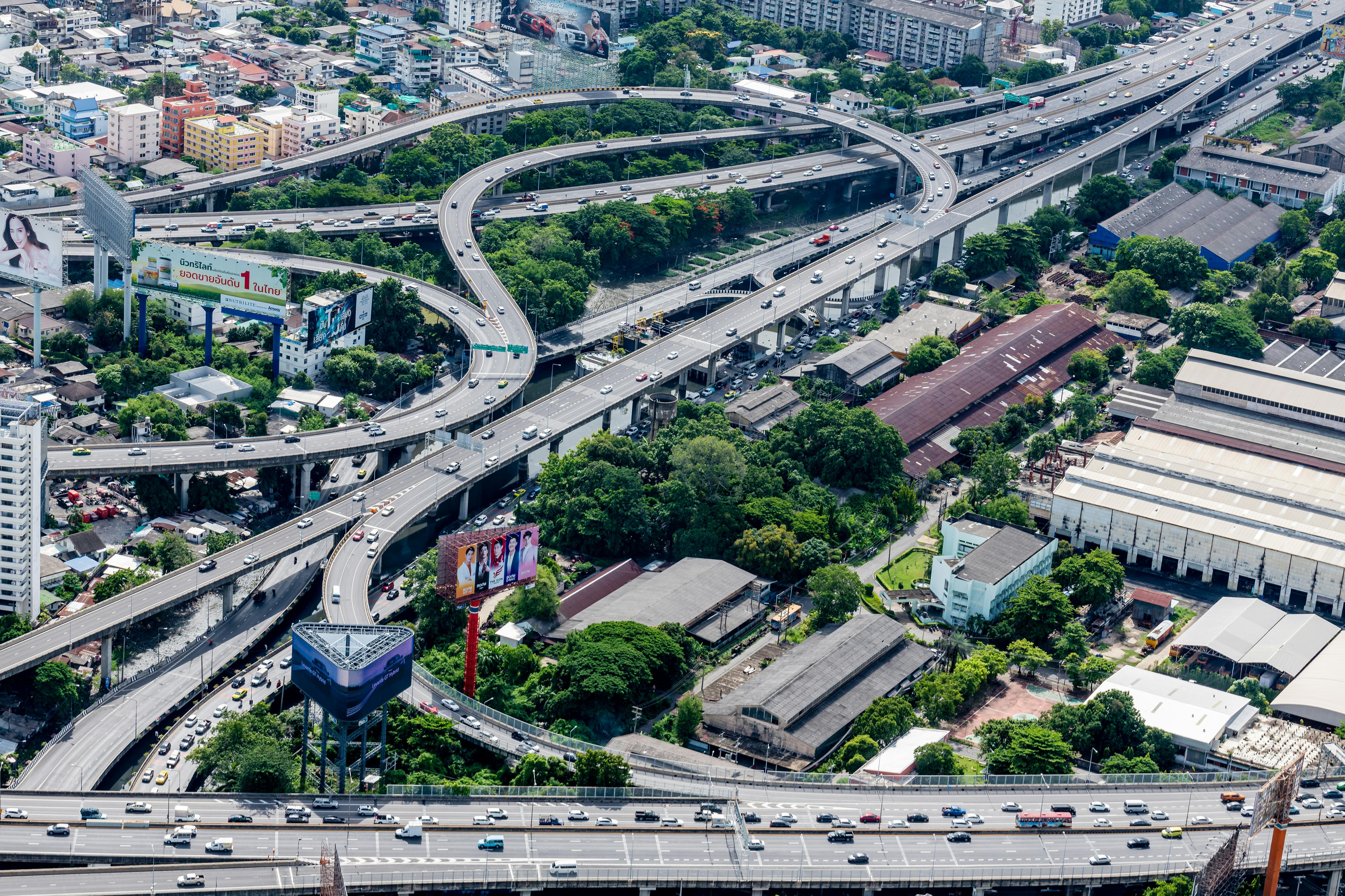 Aerial view of urban traffic along multiple overpasses, illustrating city navigation and connectivity.