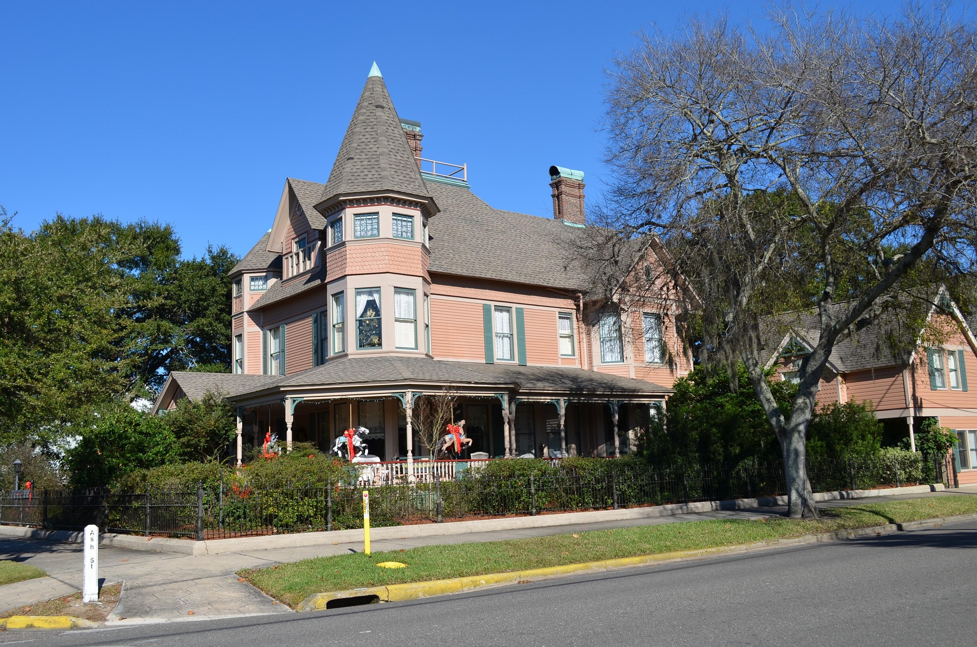The exterior of a well-preserved Victorian house, showcasing intricate detailing and classic architecture.