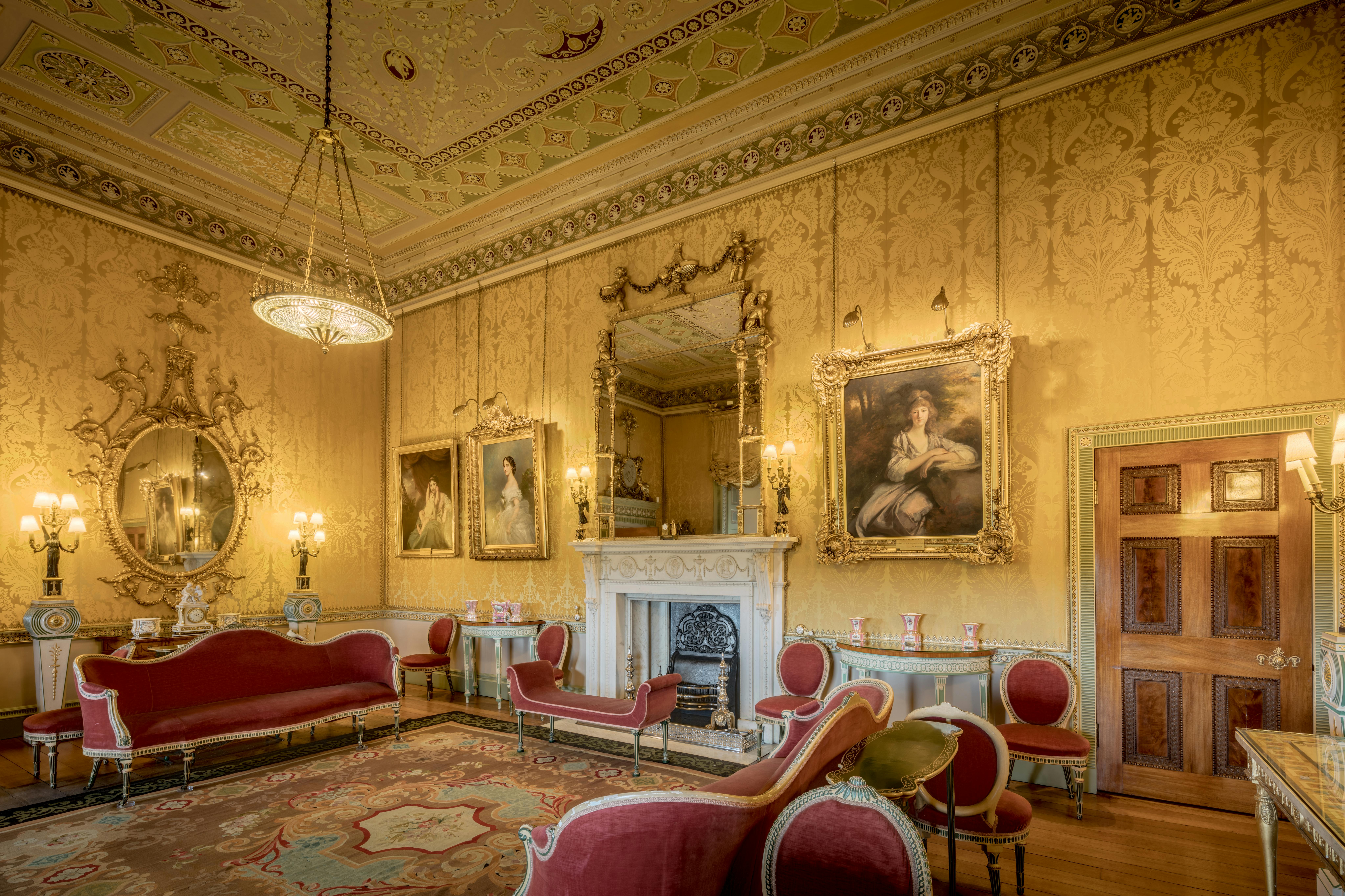 Victorian-style interior in Harewood House, featuring ornate furnishings and intricate architectural details.