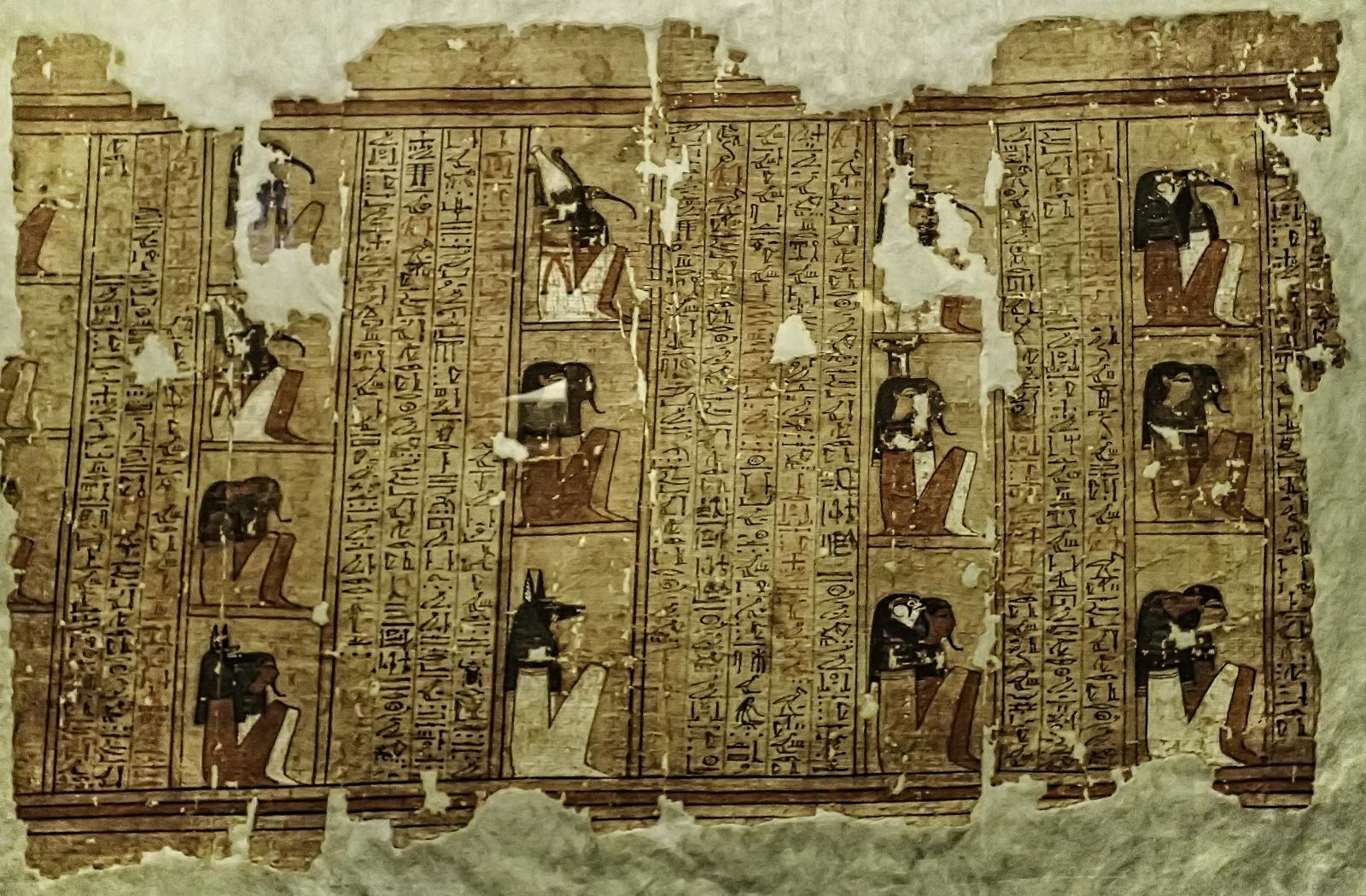 Ancient Egyptians building with tools.