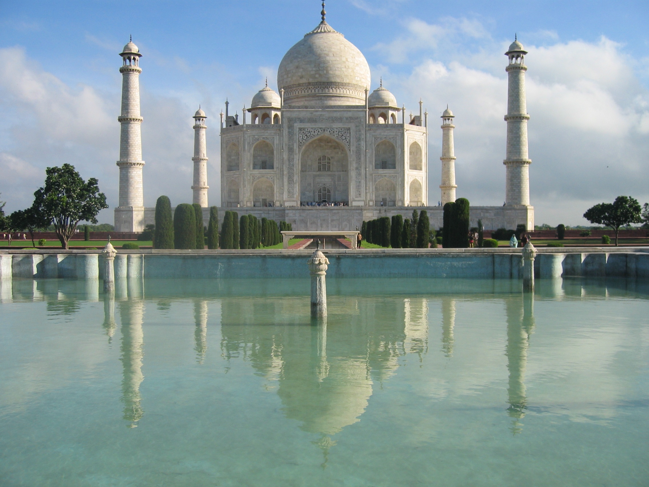 Taj Mahal with white marble domes and minarets.