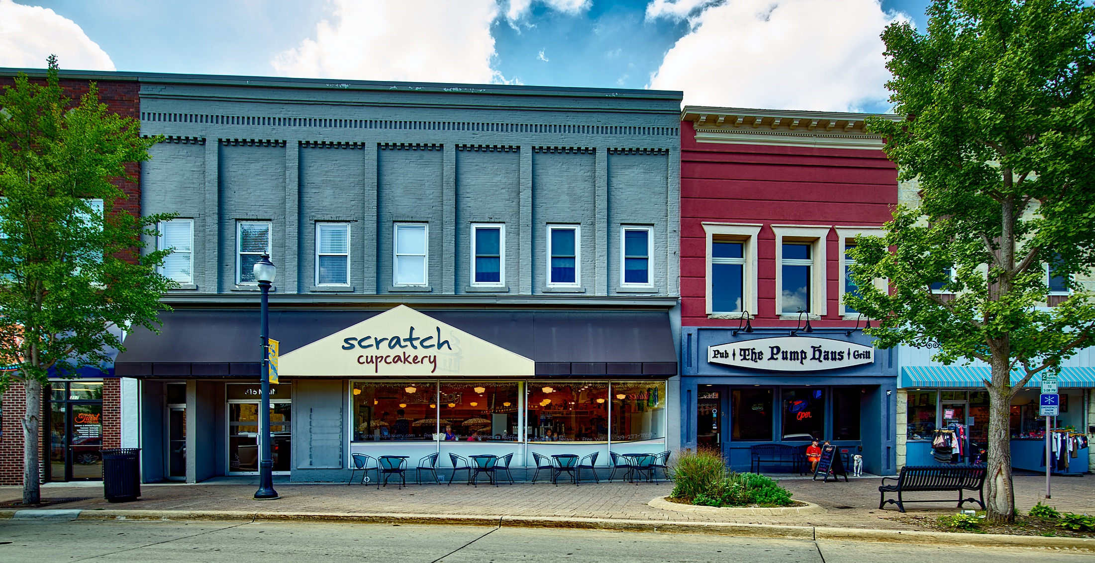 Retail buildings in a busy urban city center.