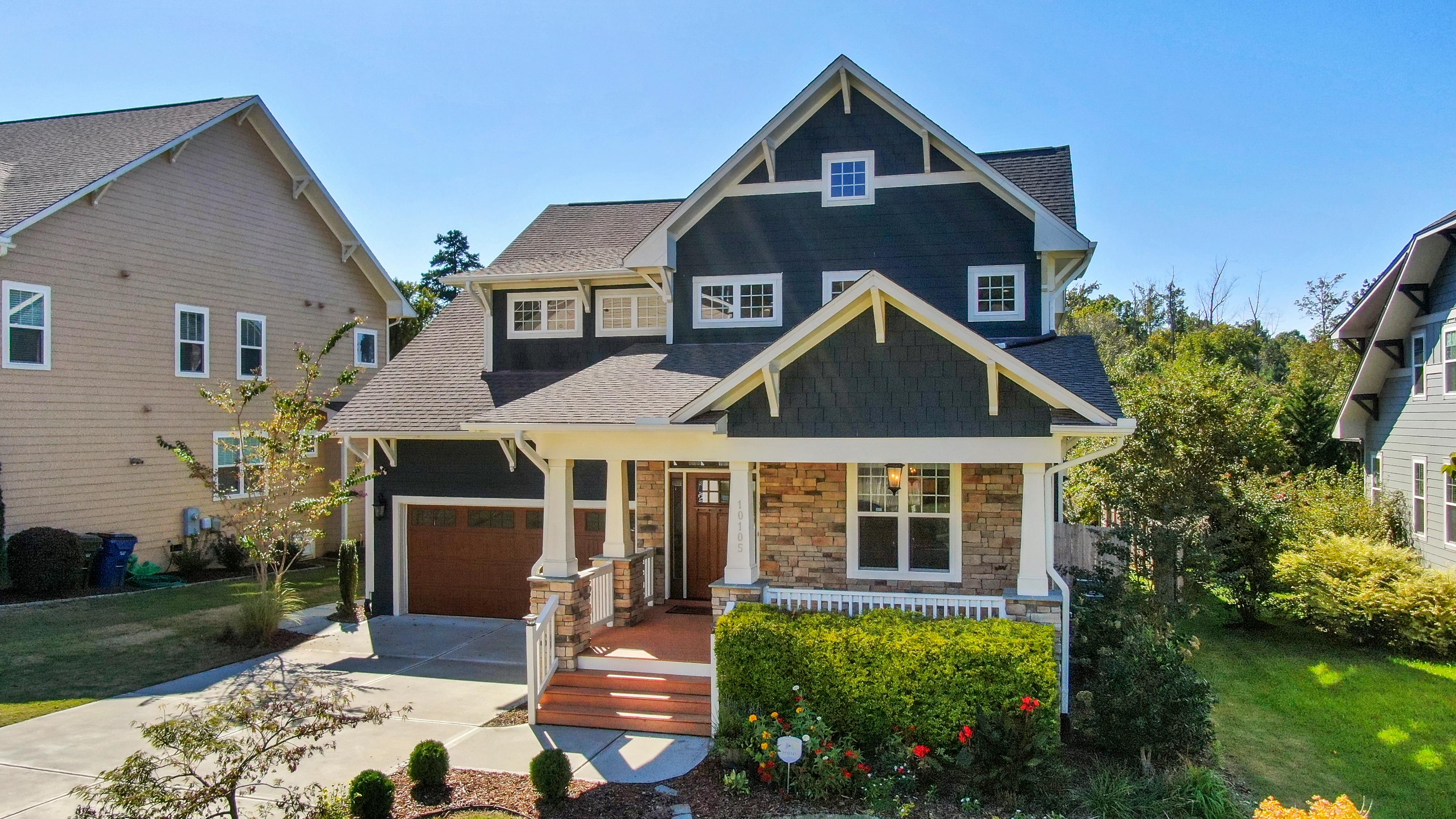 Modern American house built with natural stone exterior.