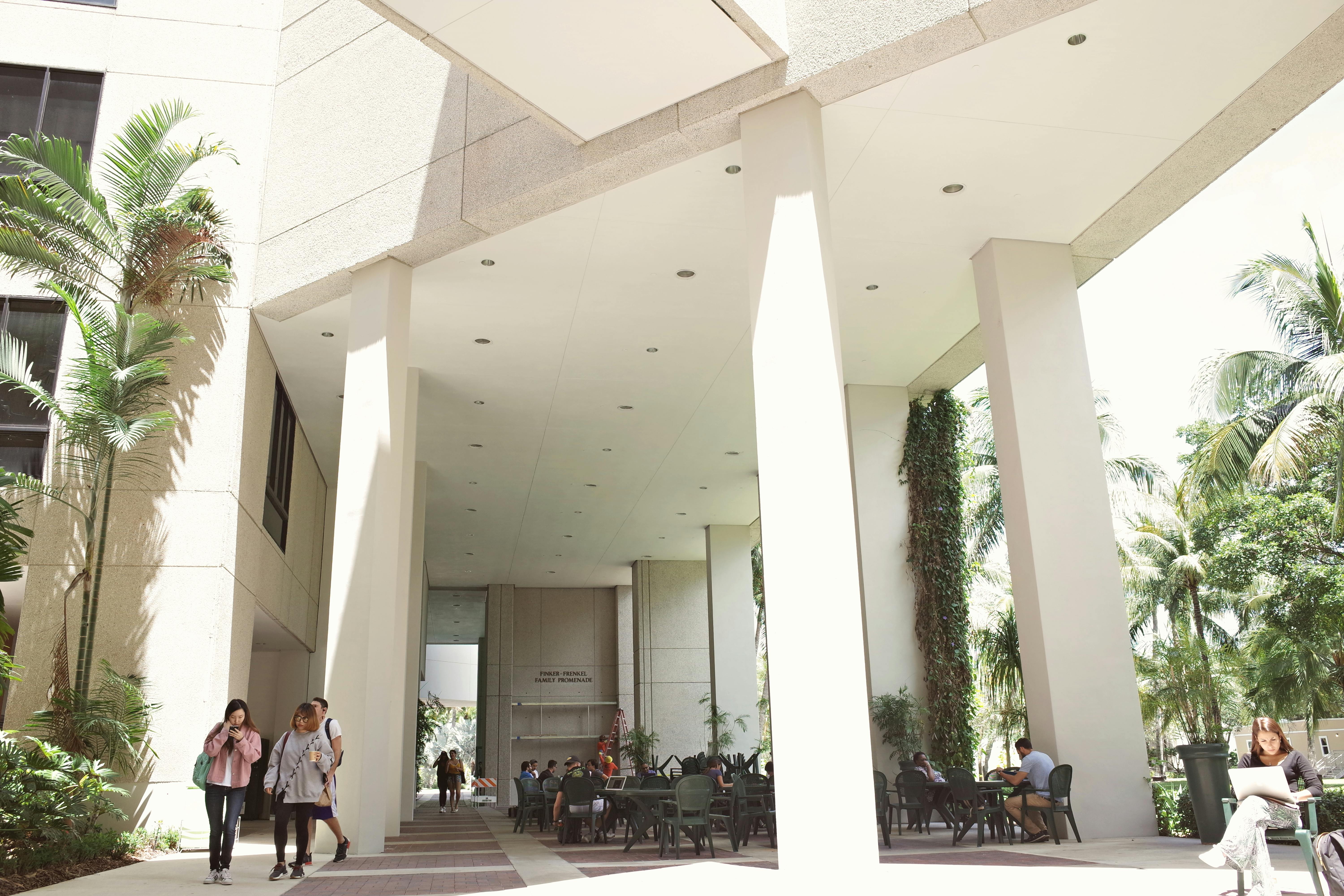Architecture students walking on university campus in Coral Gables.