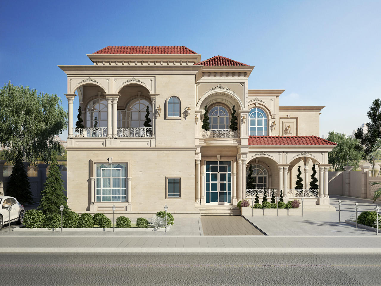 Exterior facade of a Mediterranean villa with stucco walls, red tile roof, and wrought iron details.