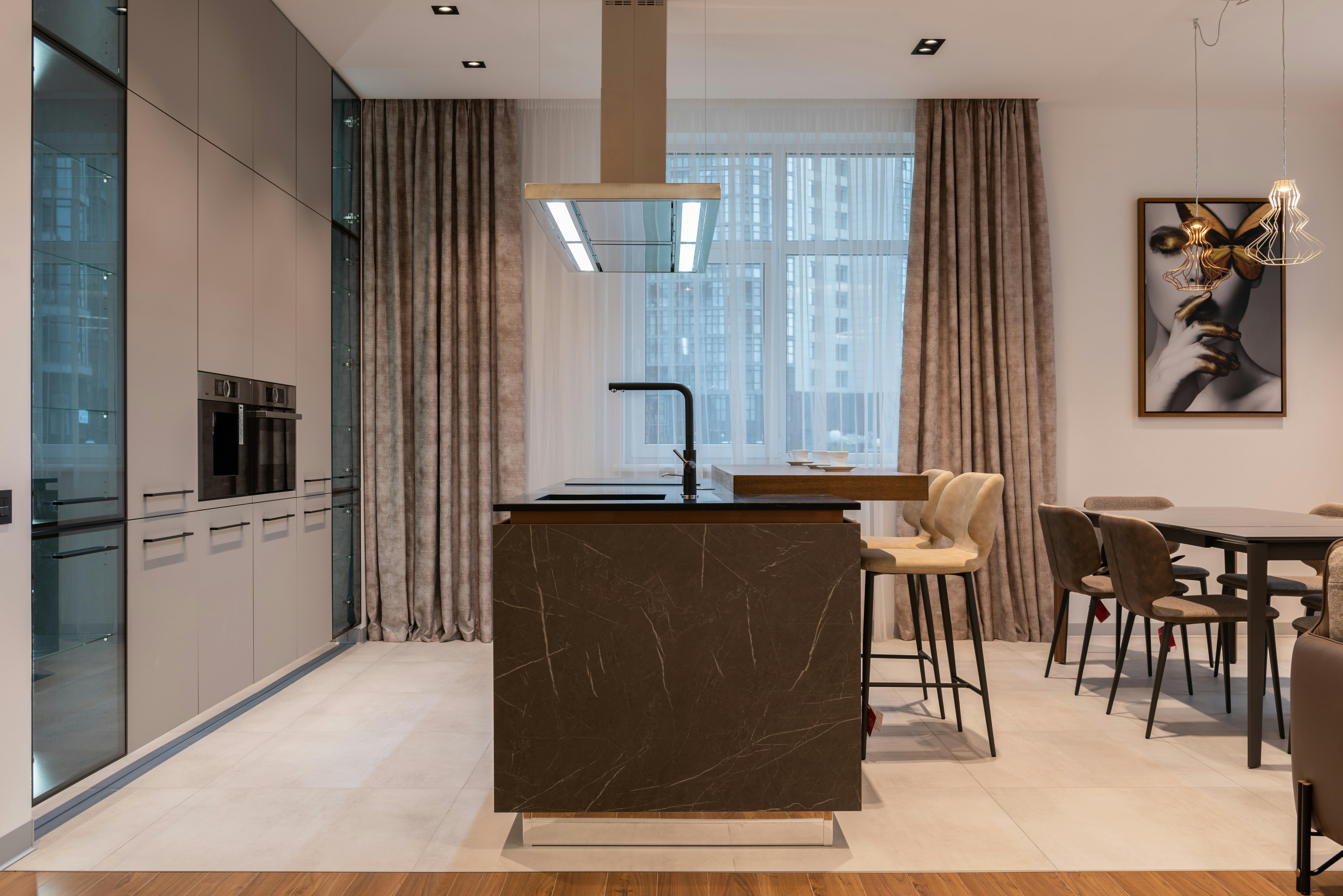 Bright modern kitchen with minimalist design and natural daylight.