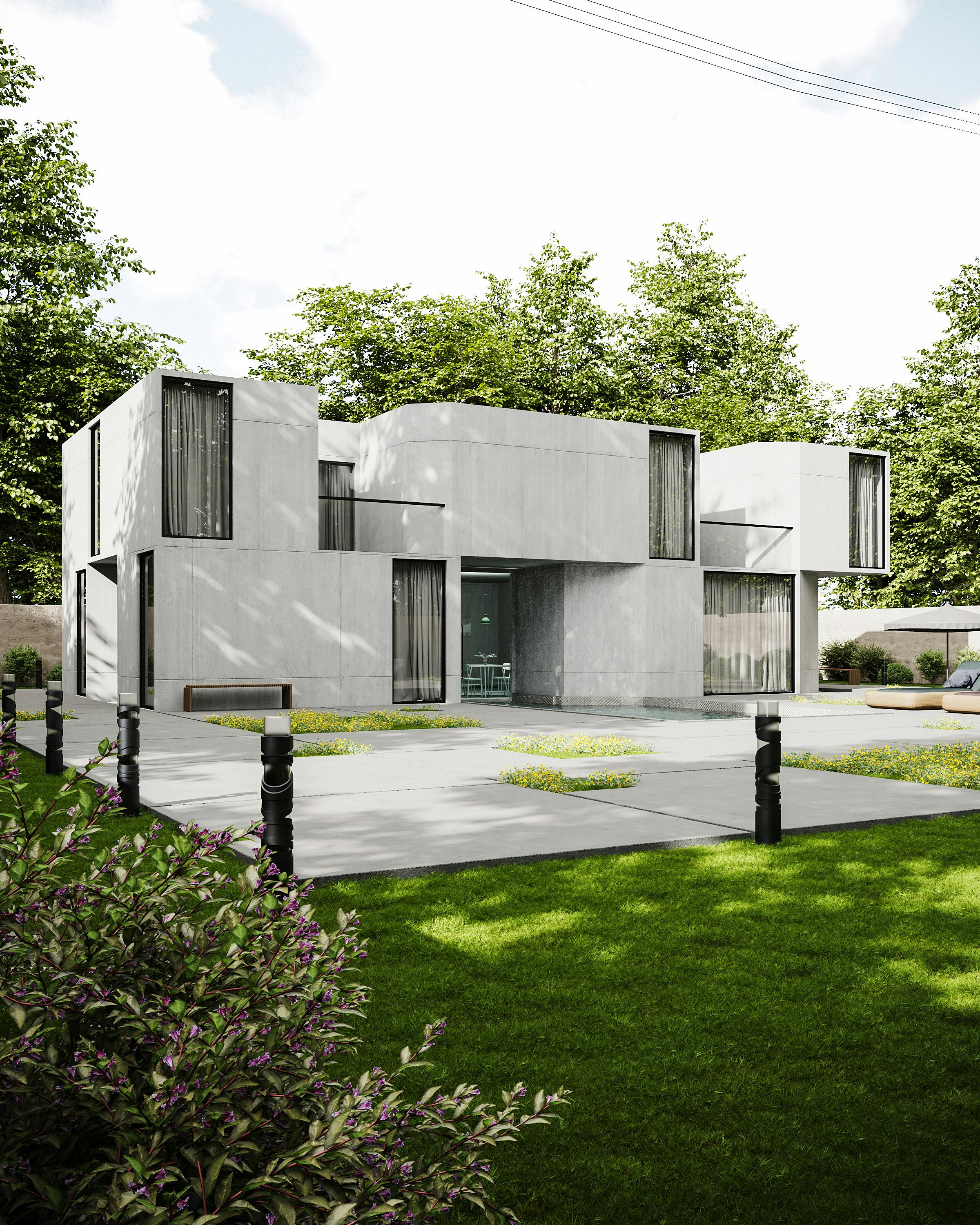 Modern minimalist concrete house facade with clean geometric design.