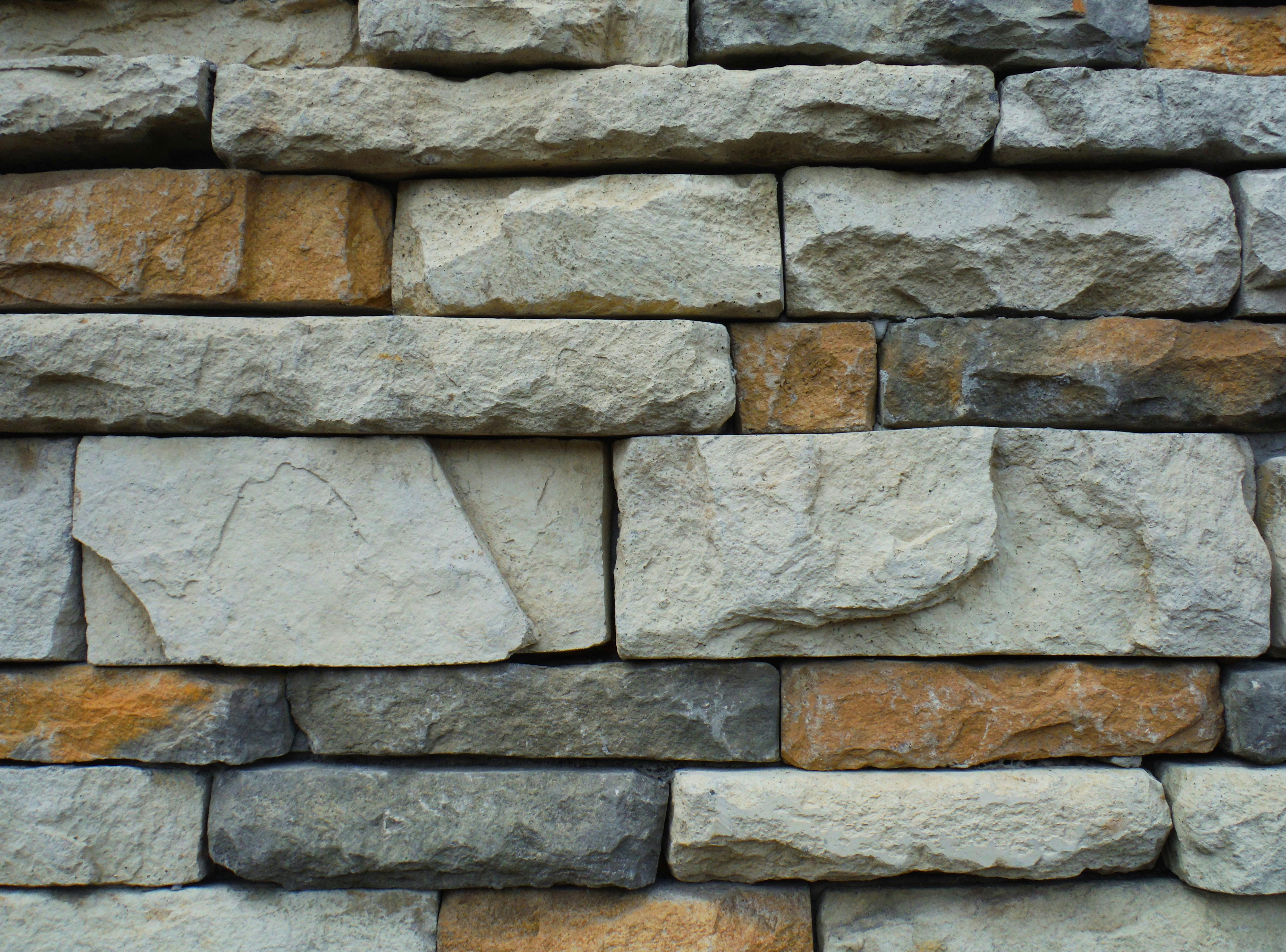 House using natural brick textures inside and outside for warm, organic feel.