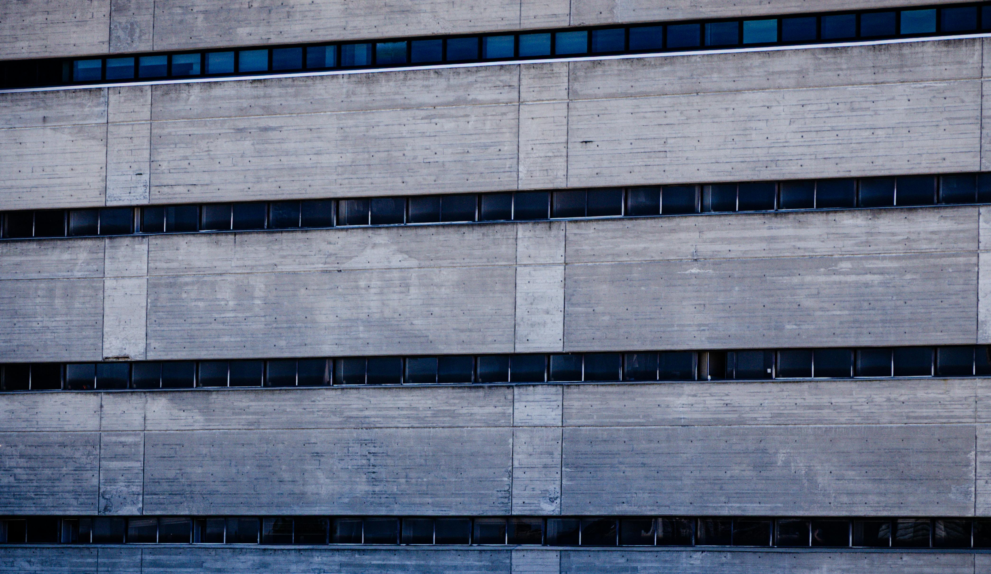 Modern concrete wall showcasing Brutalist architectural style.