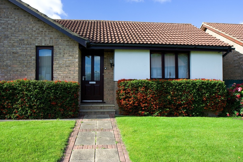 Updated brick bungalow with modern design and preserved original character.